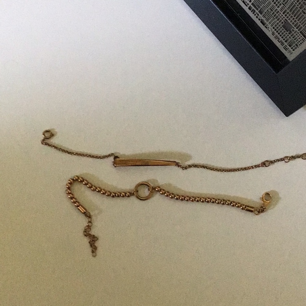 Two fossil rose gold bracelets